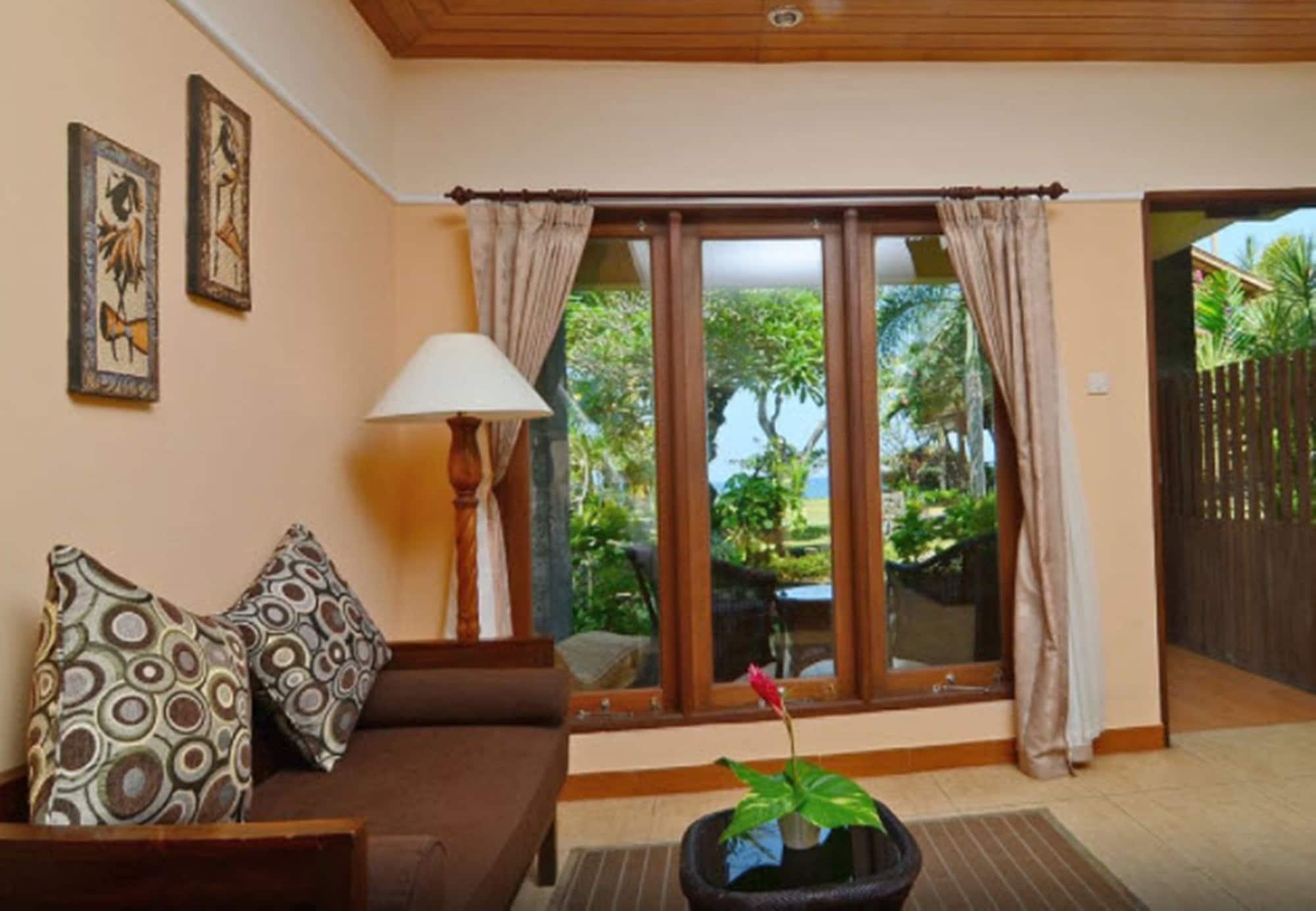 Готель Sunsethouse Lombok Mangsit Екстер'єр фото